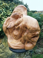 Transition wood carving (crying baby side)